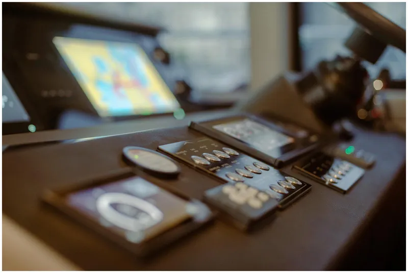 Slide: The Image of Control panel of a 2022 Azimut Fly yacht, featuring modern navigation instruments. - 29