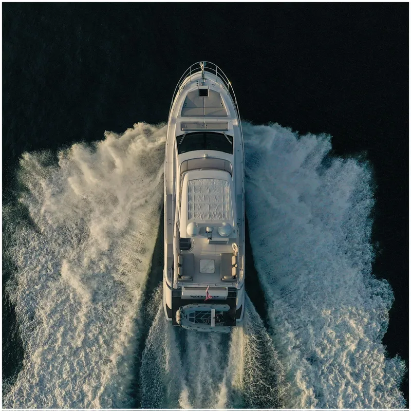 Slide: The Image of Aerial view of 2022 Azimut Fly yacht cruising on open water. - 3