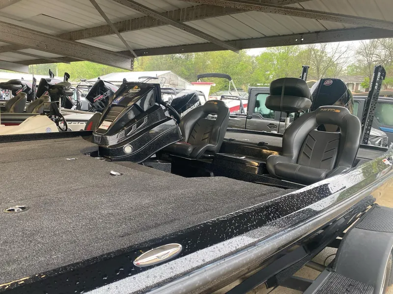 Slide: The Image of 2022 Nitro Z20 Pro bass boat with sleek black design and comfortable seating. - 8
