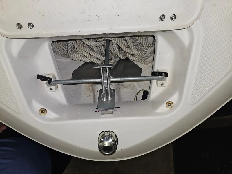 Slide: The Image of 2020 Chaparral 21 SSi OB boat anchor storage with rope and metal fittings. - 21