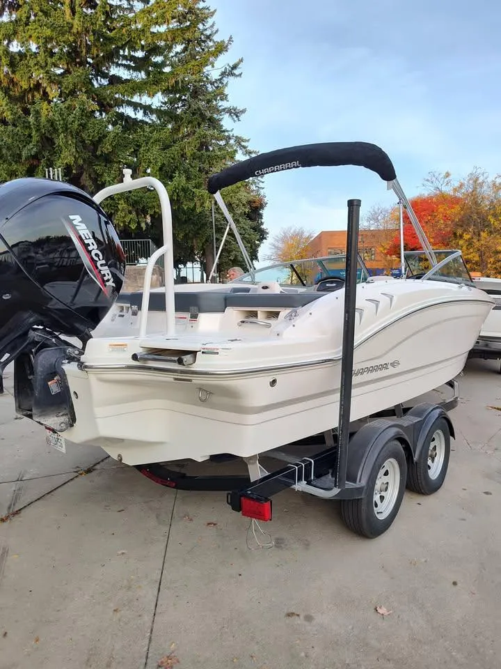 Slide: The Image of 2020 Chaparral 21 SSi OB boat with Mercury outboard motor on trailer. - 6