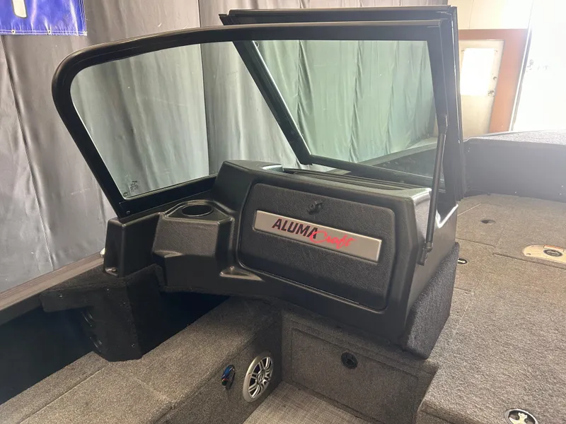 Slide: The Image of 2024 Alumacraft Competitor FSX 185 boat interior with windshield and console. - 11