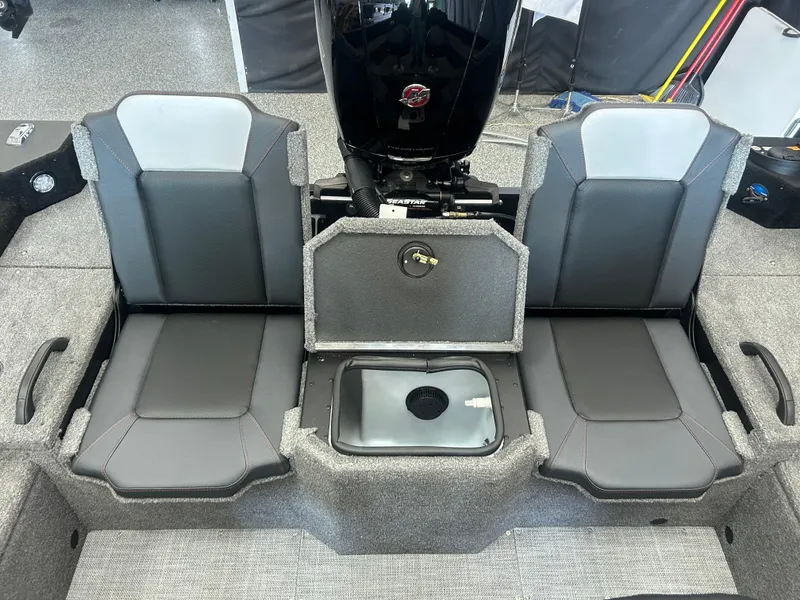 Slide: The Image of 2024 Alumacraft Competitor FSX 185 boat seats with storage compartment. - 15