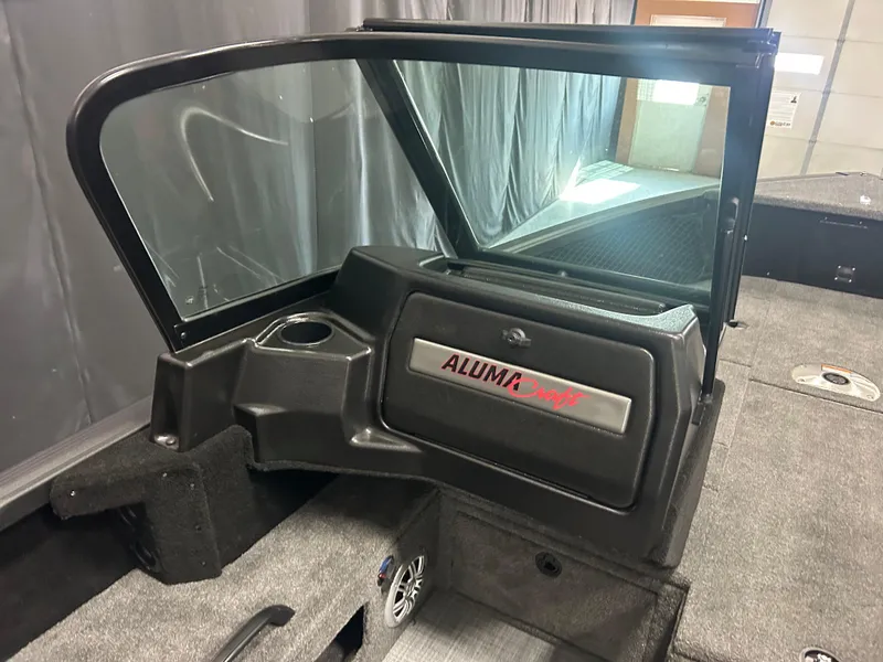 Slide: The Image of 2024 Alumacraft Competitor FSX 175 boat interior with windshield and dashboard. - 12