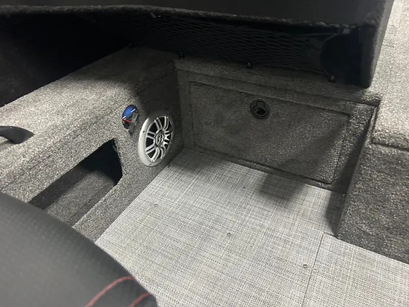 Slide: The Image of 2024 Alumacraft Competitor FSX 175 interior with speaker and storage compartment. - 18