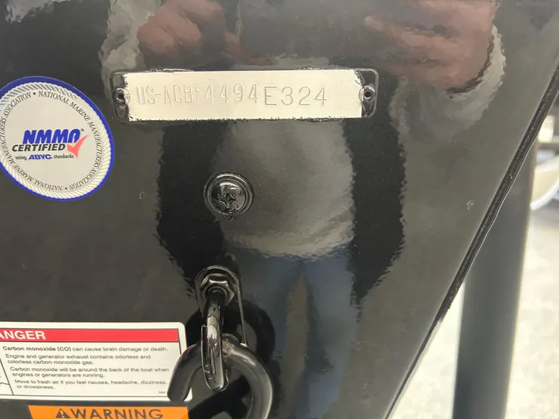 Slide: The Image of 2024 Alumacraft Competitor FSX 175 boat identification plate with certification and warning labels. - 21