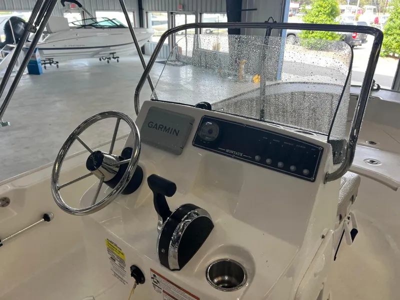Slide: The Image of 2022 Boston Whaler 170 Montauk boat console with Garmin navigation system. - 4