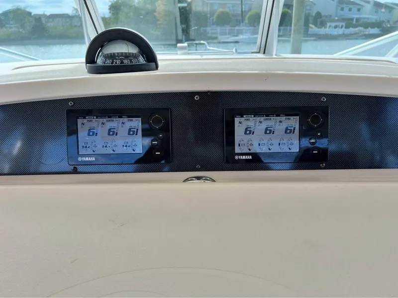 Slide: The Image of Dashboard of 2005 Grady-White Express 360 with Yamaha displays and compass. - 12