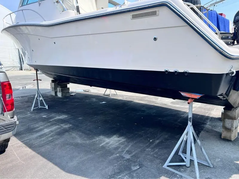 Slide: The Image of 2005 Grady-White Express 360 boat on stands for maintenance. - 4