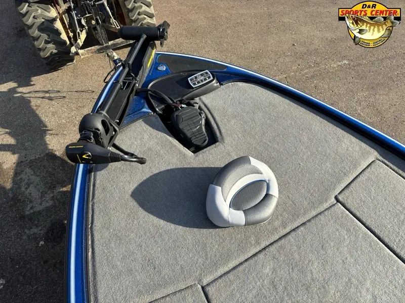 Slide: The Image of 2015 Nitro Z-9 boat deck with trolling motor and seat, displayed at DAR Sports Center. - 9