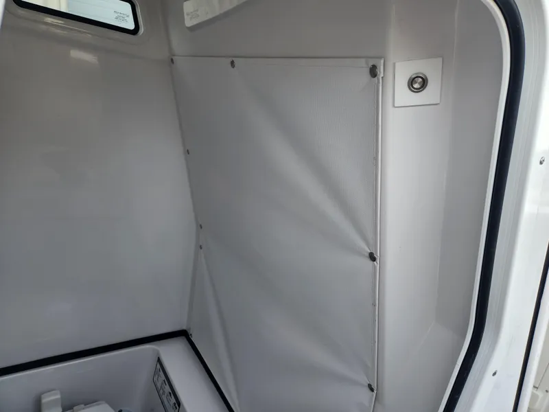 Slide: The Image of 2025 Sportsman Open 262 Center Console interior cabin detail. - 19