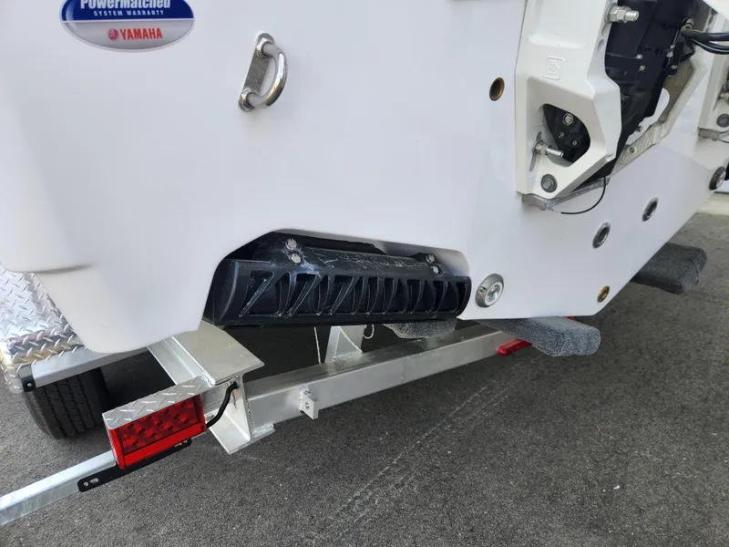 Slide: The Image of 2025 Sportsman Open 262 Center Console boat on trailer, featuring Yamaha components. - 34