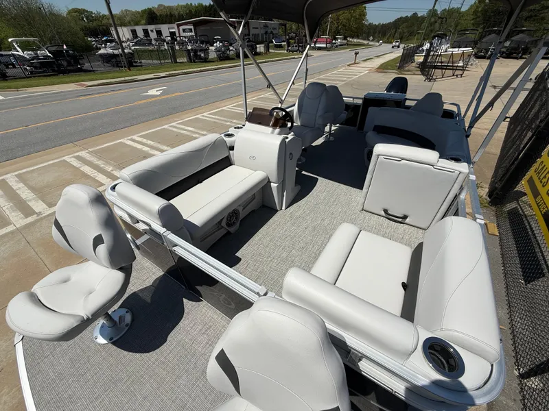 Slide: The Image of 2022 Avalon Venture Fish pontoon boat with spacious seating and modern design. - 30