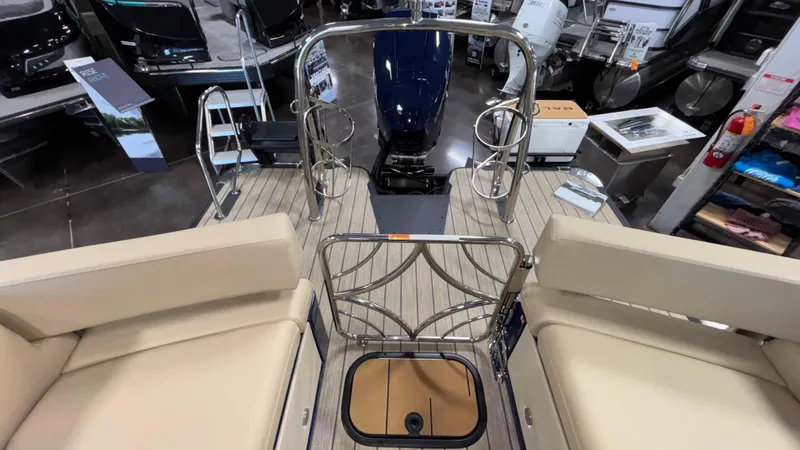 Slide: The Image of 2025 Balise Helix 26C boat interior with beige seating and modern design. - 11