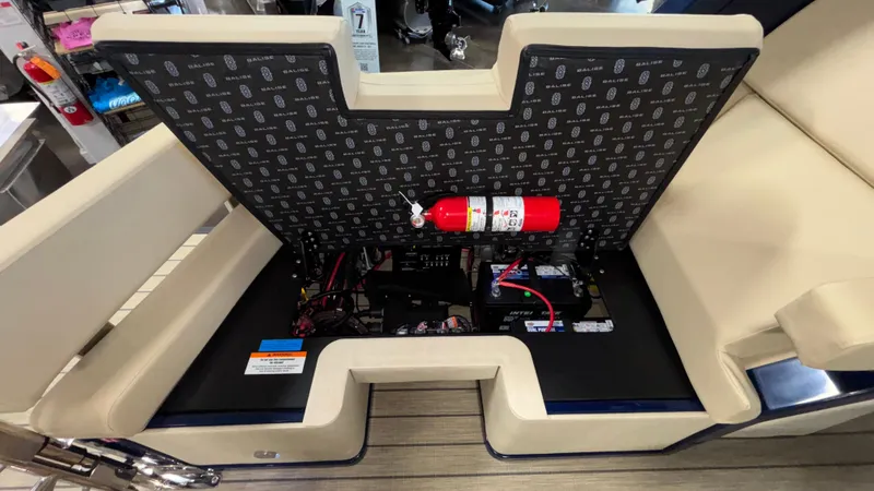 Slide: The Image of Interior view of Balise Helix 26C 2025 boat storage compartment with fire extinguisher. - 15