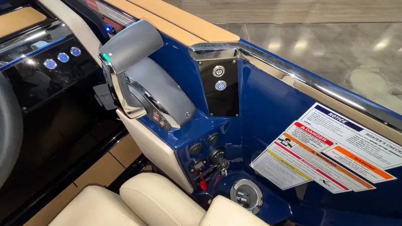 Slide: The Image of Control panel of 2025 Balise Helix 26C boat with throttle and safety instructions. - 27