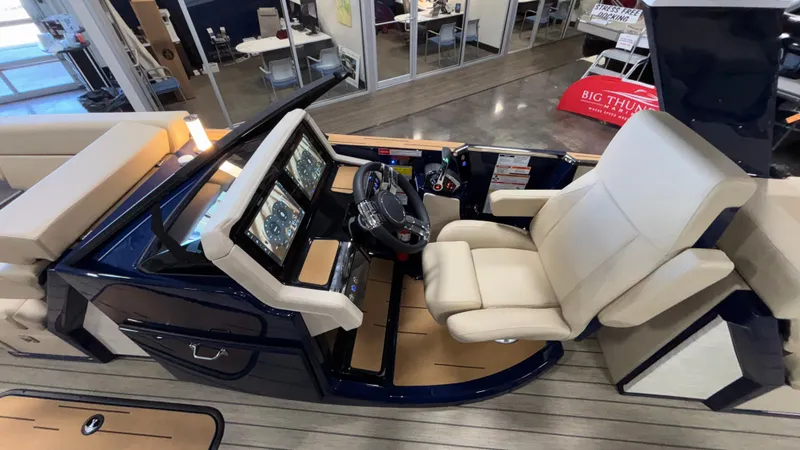 Slide: The Image of Luxurious interior of 2025 Balise Helix 26C boat with modern dashboard and seating. - 30