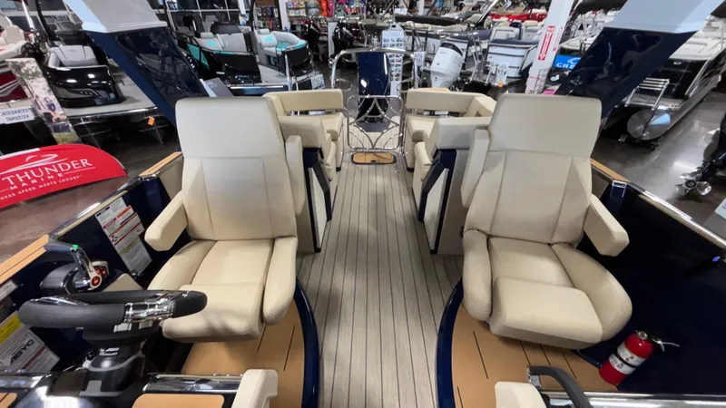 Slide: The Image of Luxurious interior of 2025 Balise Helix 26C boat with plush seating and modern design. - 7