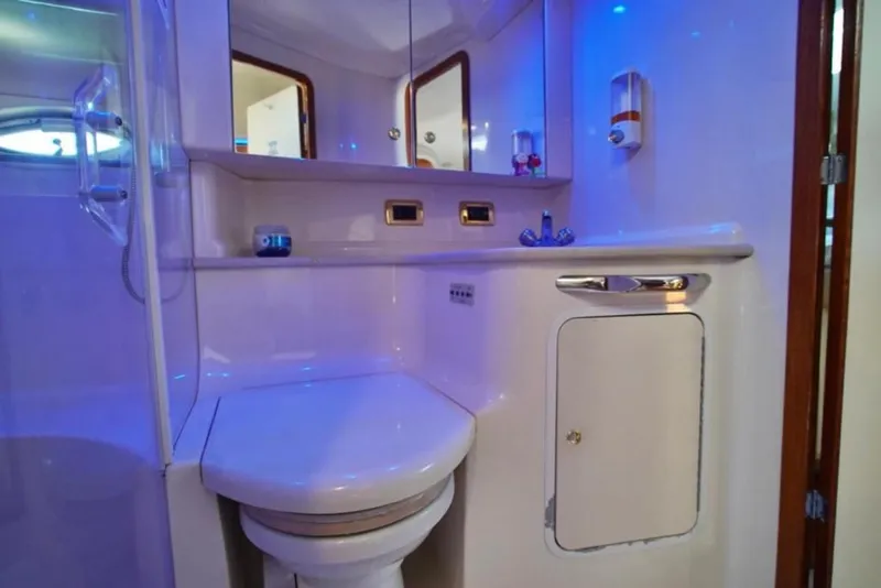 Slide: The Image of Luxurious bathroom in 2001 Sea Ray 460 Sundancer yacht with modern fixtures. - 25