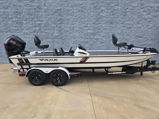 The Image of 2025 Vexus AVX2080 fishing boat with dual seats and trailer, parked on concrete. - 1