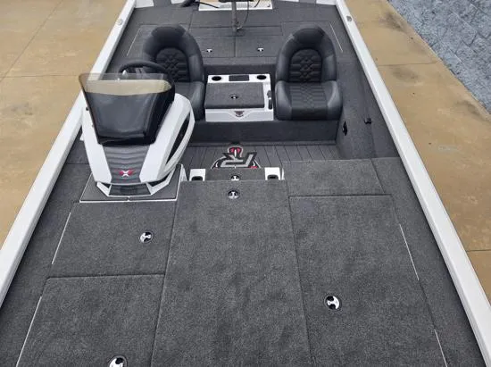 Slide: The Image of 2025 Vexus AVX2080 boat interior with dual seats and steering console. - 5