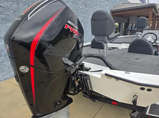 Slide: The Image of 2025 Vexus AVX2080 boat with Mercury Pro XS engine, showcasing sleek design and seating. - 9