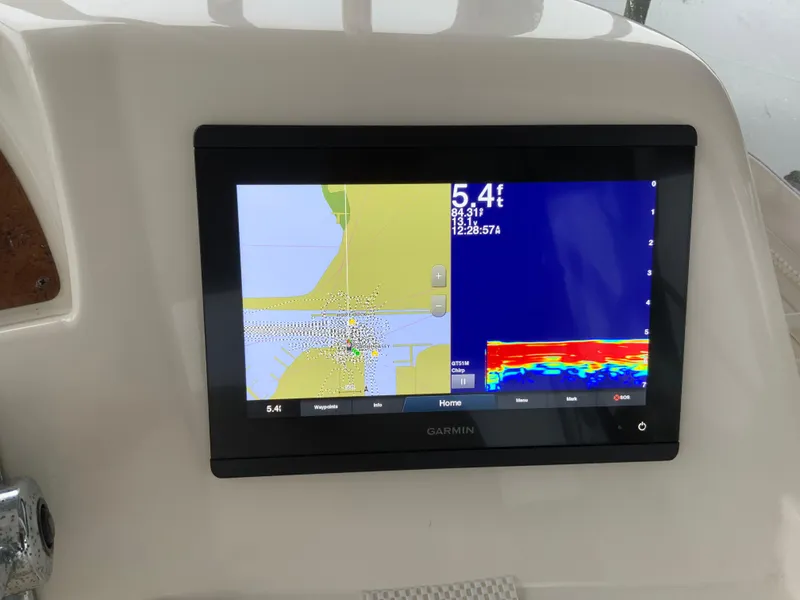 Slide: The Image of Garmin navigation display on 2007 Silverton 33 Convertible boat dashboard. - 21