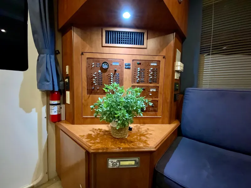 Slide: The Image of Interior of 2007 Silverton 33 Convertible with control panel and potted plant. - 35