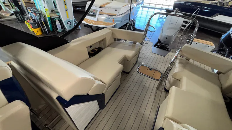 Slide: The Image of Interior of 2025 Balise Horizon 26C boat with beige seating and sleek design. - 10