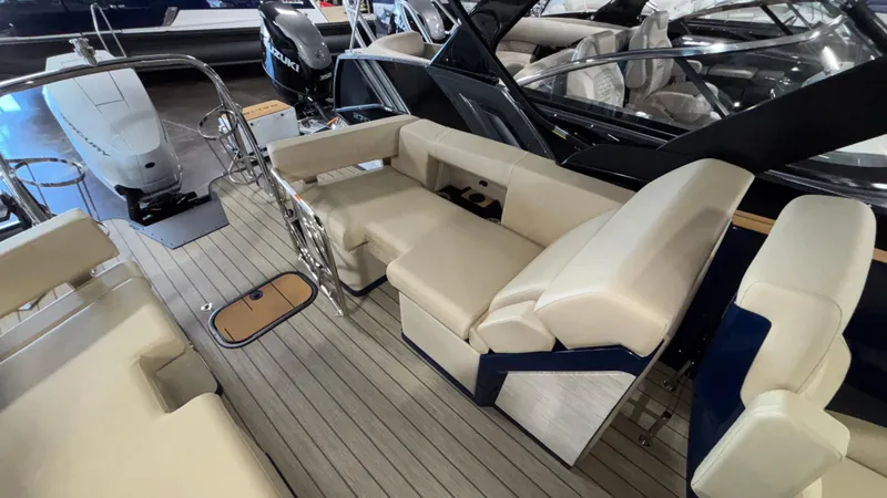 Slide: The Image of 2025 Balise Horizon 26C boat interior with beige seating and modern design. - 11