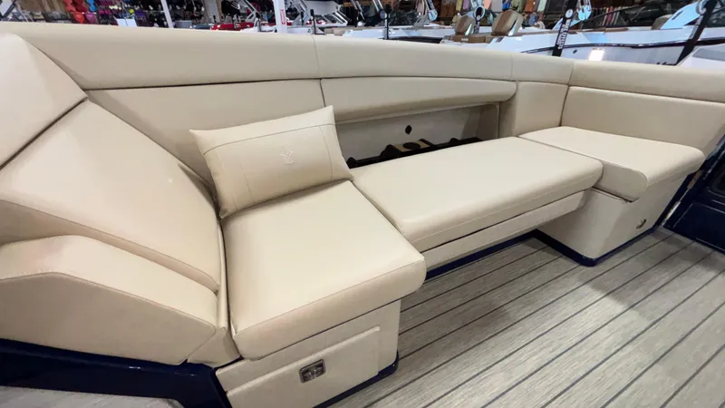 Slide: The Image of Luxurious seating on 2025 Balise Horizon 26C boat with beige upholstery. - 18