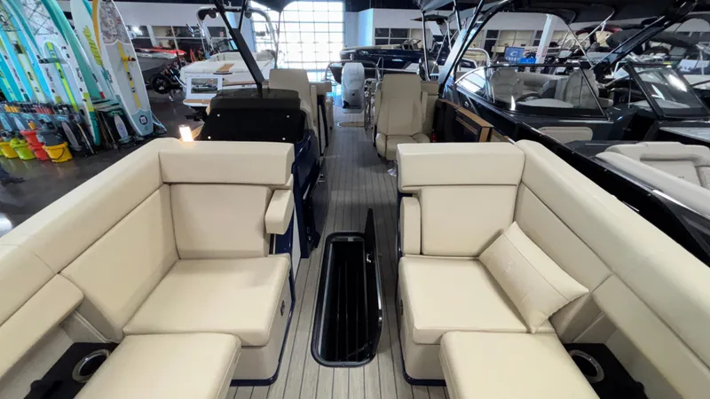Slide: The Image of 2025 Balise Horizon 26C boat interior with beige seating and modern design. - 23