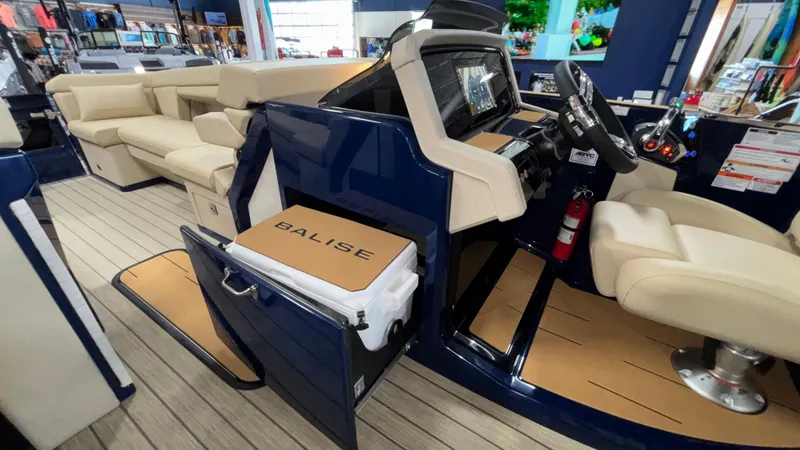 Slide: The Image of Luxury interior of 2025 Balise Horizon 26C boat with modern seating and control panel. - 25