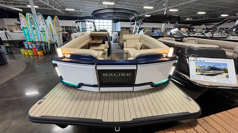 Slide: The Image of 2025 Balise Horizon 26C luxury boat displayed in a showroom with sleek design. - 4