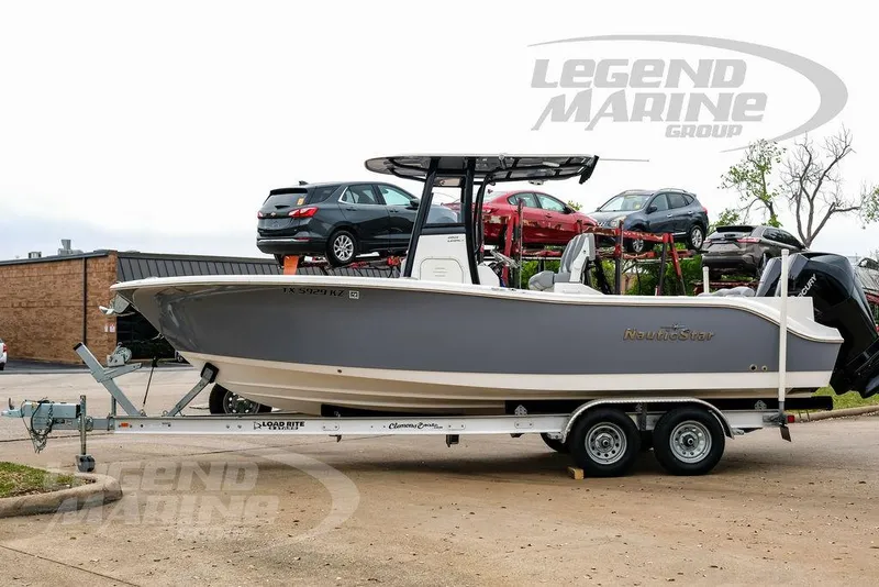 Slide: The Image of 2022 NauticStar 2602 Legacy boat on trailer at Legend Marine Group. - 13