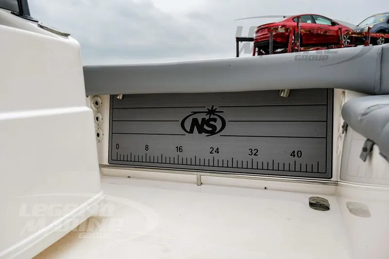 Slide: The Image of 2022 NauticStar 2602 Legacy boat with built-in measuring board. - 26