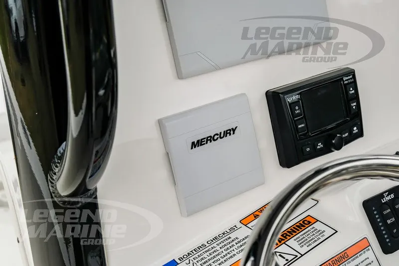 Slide: The Image of Control panel of 2022 NauticStar 2602 Legacy boat with Mercury and Infinity systems. - 33