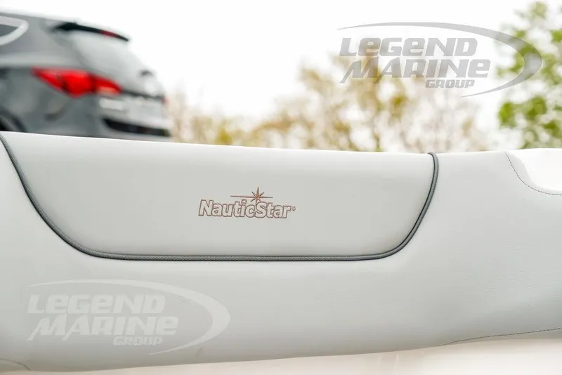 Slide: The Image of 2022 NauticStar 2602 Legacy boat seat with logo, Legend Marine Group branding. - 40