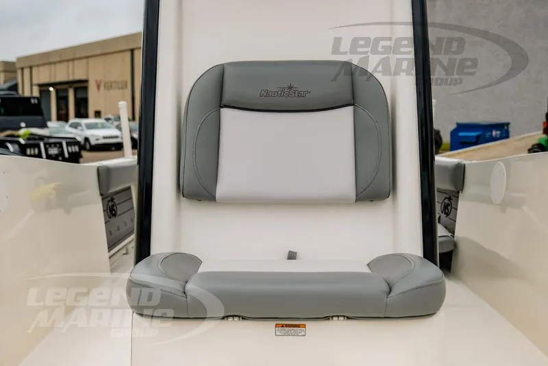 Slide: The Image of 2022 NauticStar 2602 Legacy boat seat with gray and white upholstery. - 41