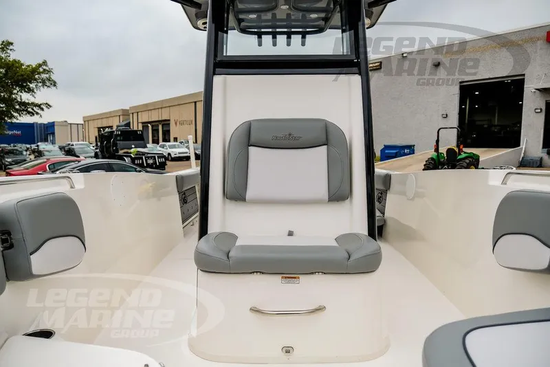 Slide: The Image of 2022 NauticStar 2602 Legacy boat interior with gray seating and modern design. - 43