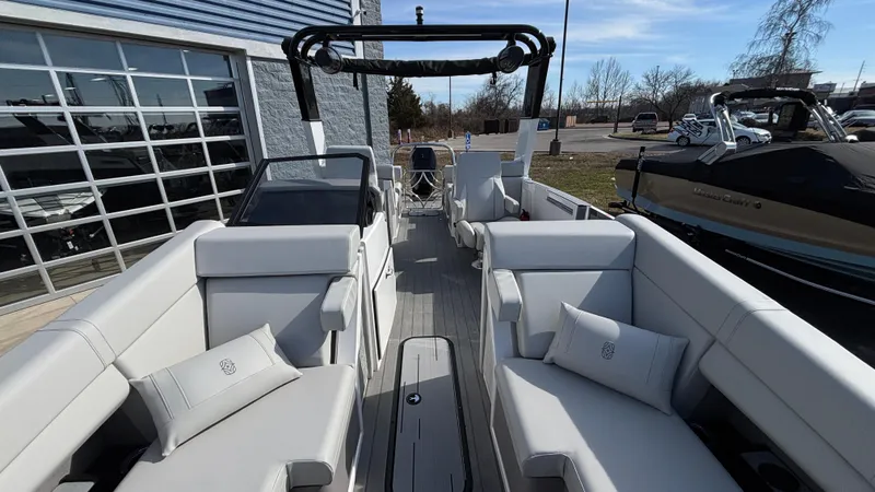 Slide: The Image of 2025 Balise Helix 24C boat interior with spacious seating and modern design. - 13