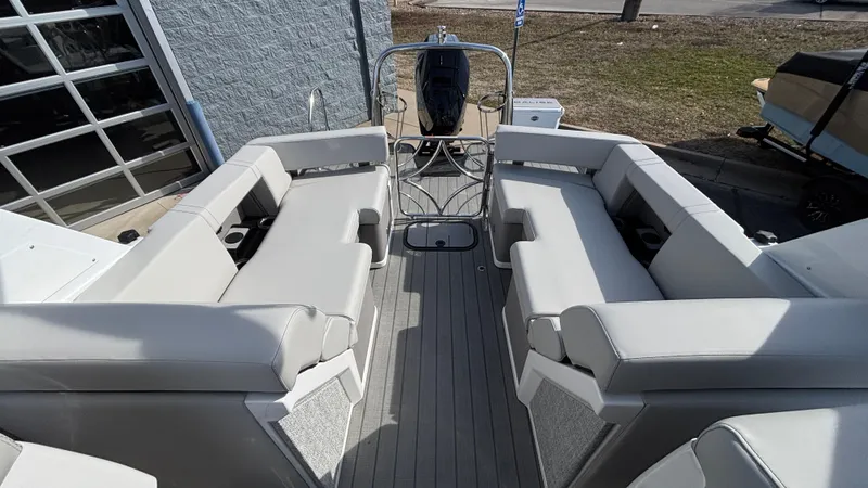 Slide: The Image of Interior of 2025 Balise Helix 24C boat with seating and storage compartments. - 14