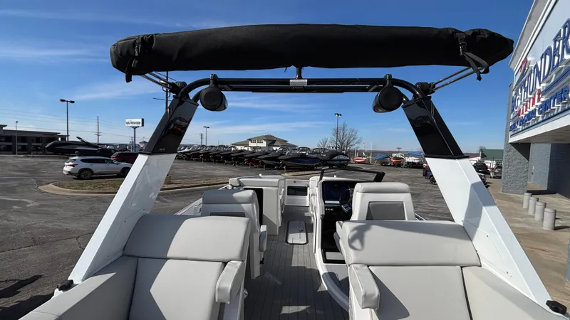 Slide: The Image of 2025 Balise Helix 24C boat interior with luxurious white seating and modern design. - 17