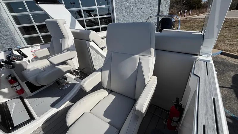 Slide: The Image of Interior view of 2025 Balise Helix 24C boat, featuring modern design and textured flooring. - 23