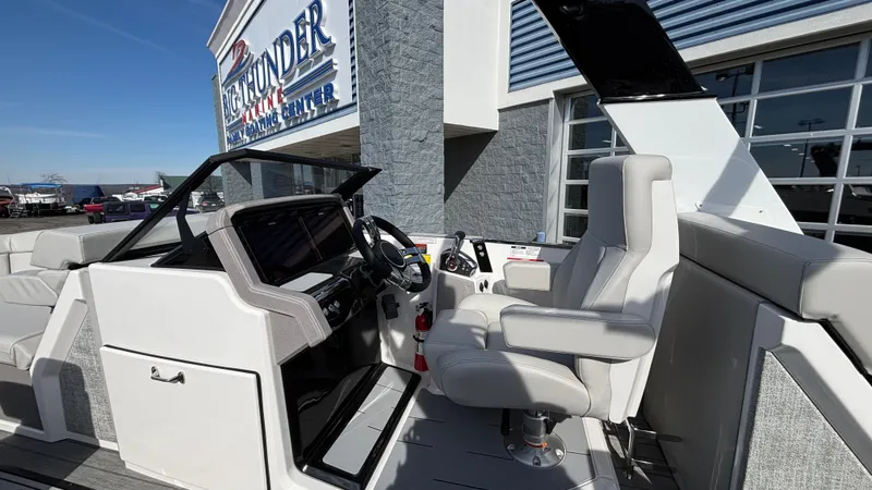 Slide: The Image of 2025 Balise Helix 24C boat interior with modern seating and sleek design. - 8