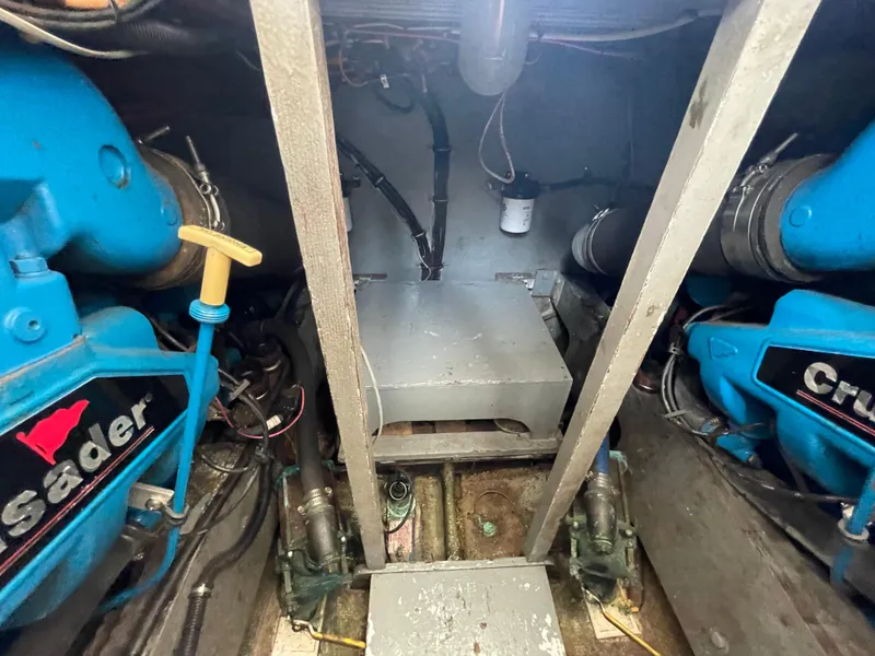 Slide: The Image of Engine room of a 1978 Bertram 33 Flybridge Cruiser with twin Crusader engines. - 16