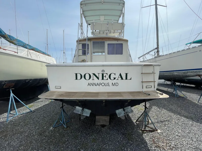 Slide: The Image of 1978 Bertram 33 Flybridge Cruiser named Donegal, docked in Annapolis, MD. - 6