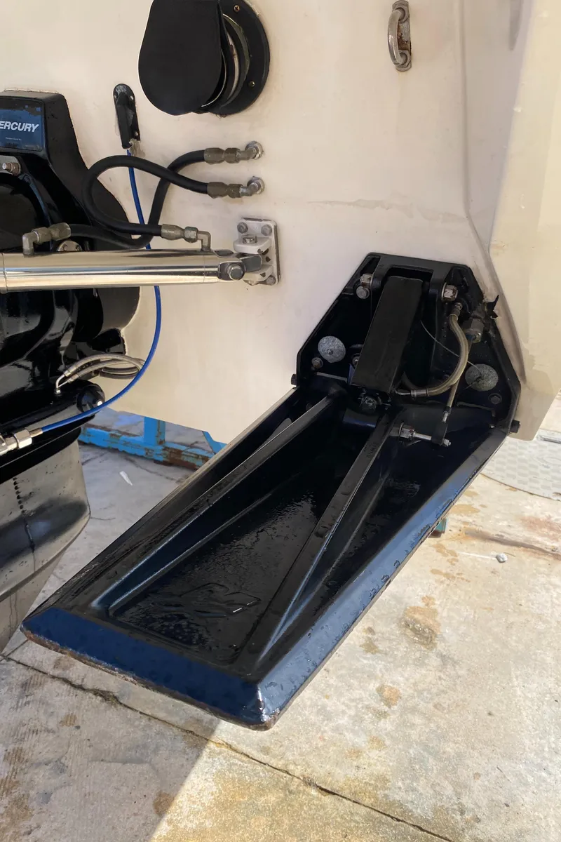 Slide: The Image of 2006 Fountain 42 Executioner boat trim tab and hydraulic system detail. - 18