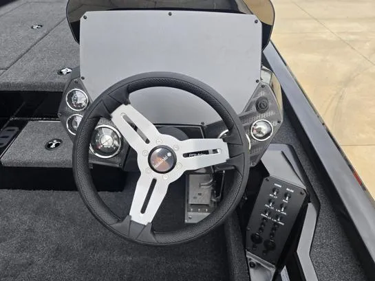 Slide: The Image of Steering console of 2025 Vexus AVX1980 boat with modern controls and dashboard. - 6