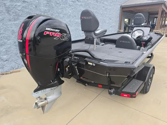 Slide: The Image of 2025 Vexus AVX1980 boat with Mercury Pro XS 150 engine, parked on a trailer. - 8